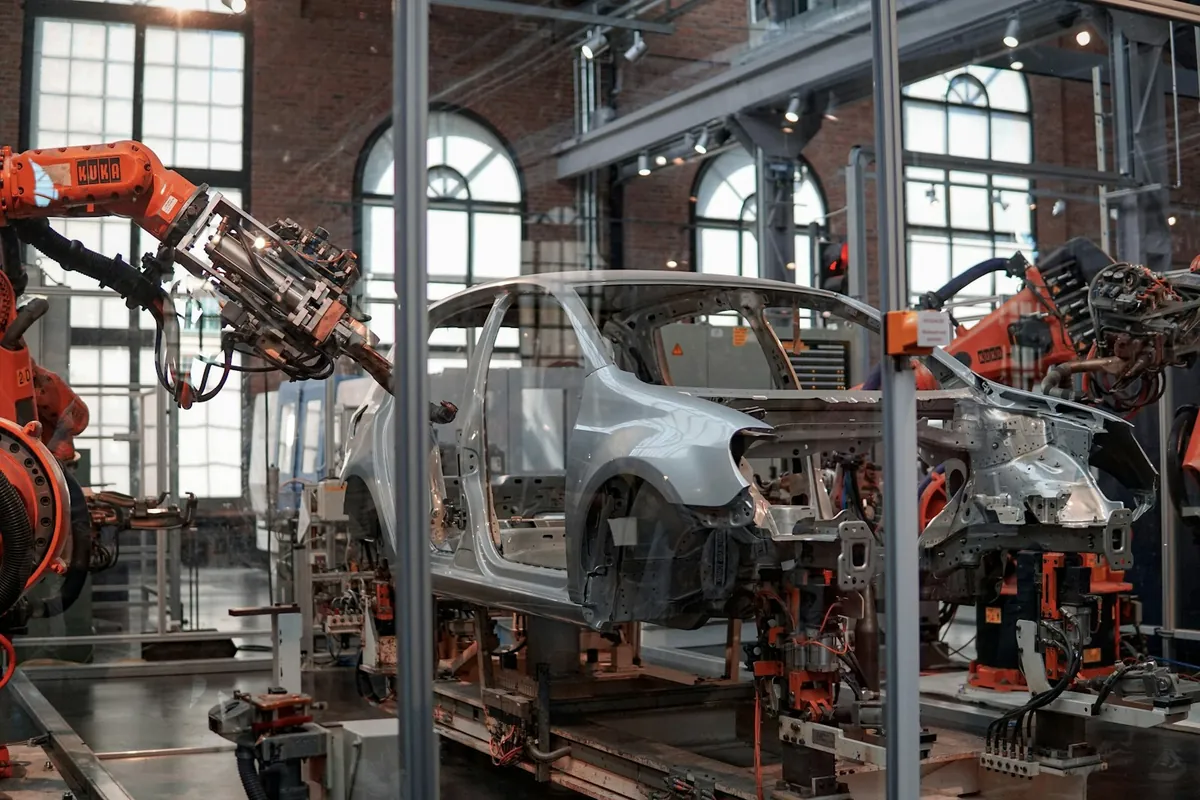 Robotic arms on a car production line